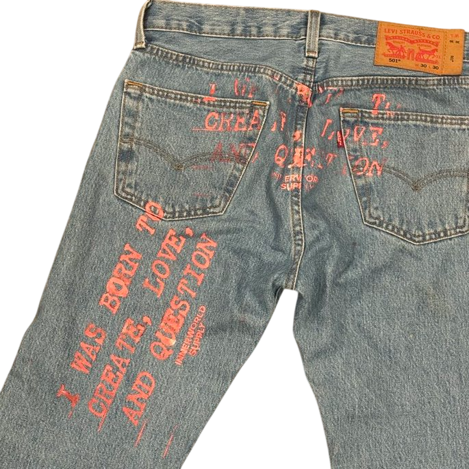 Reconstructed Levi's 501 denim, red distressed screenprint on back panel and thigh